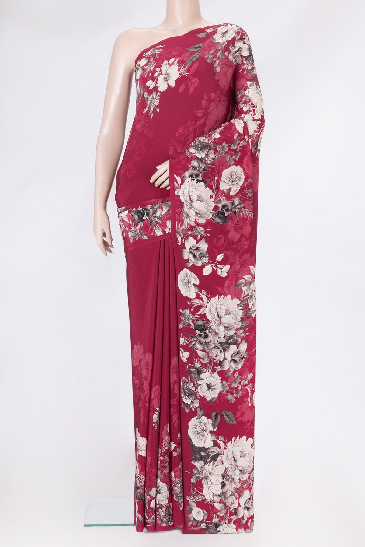 Dark Pink Dual Tone Crepe Saree with Printed design on the body and Without Border.  displayed on a mannequin