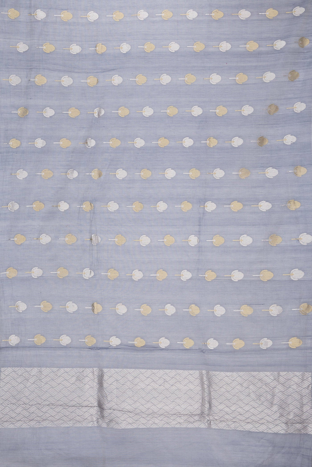 Flat view of Grey Dual Tone Organza Silk Saree with Zari Butta on the body and Zari Border. 