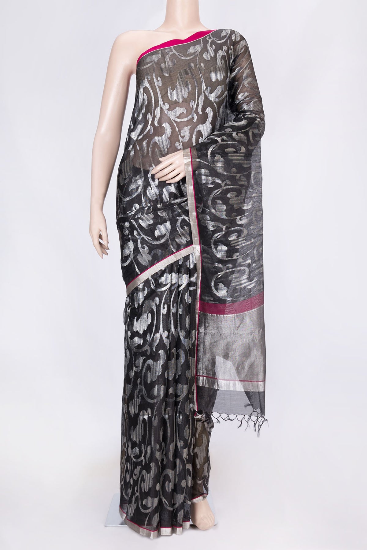 Black Dual Tone Organza Silk Saree with Zari Brocade on the body and Zari Border displayed on a mannequin