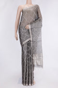 Grey Dual Tone Organza Silk Saree with Zari Brocade on the body and Zari Border.  displayed on a mannequin