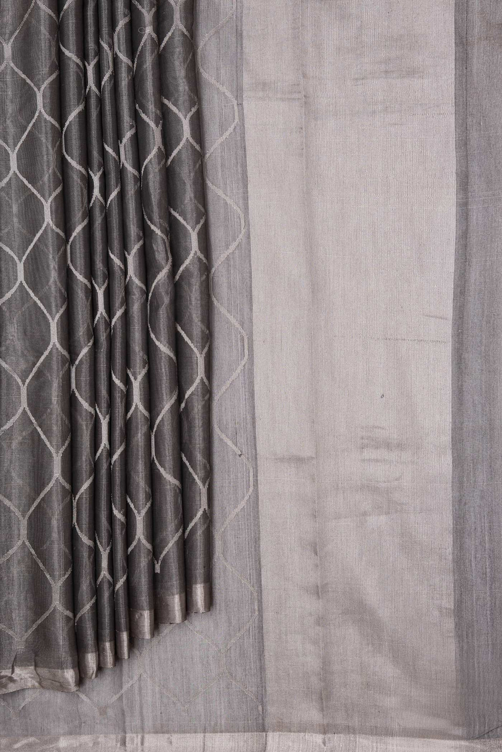 Pleats and pallu of Grey Dual Tone Organza Silk Saree with Zari Brocade on the body and Zari Border. 
