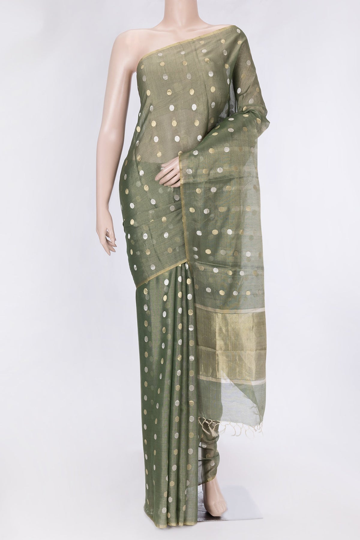 Bottle Green Dual Tone Chanderi Silk Saree with Zari Butta on the body and Thin Zari Line.  displayed on a mannequin