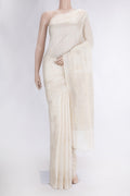 Beige Dual Tone Tussar Silk Saree with Zari Butta on the body and Fancy Border.  displayed on a mannequin