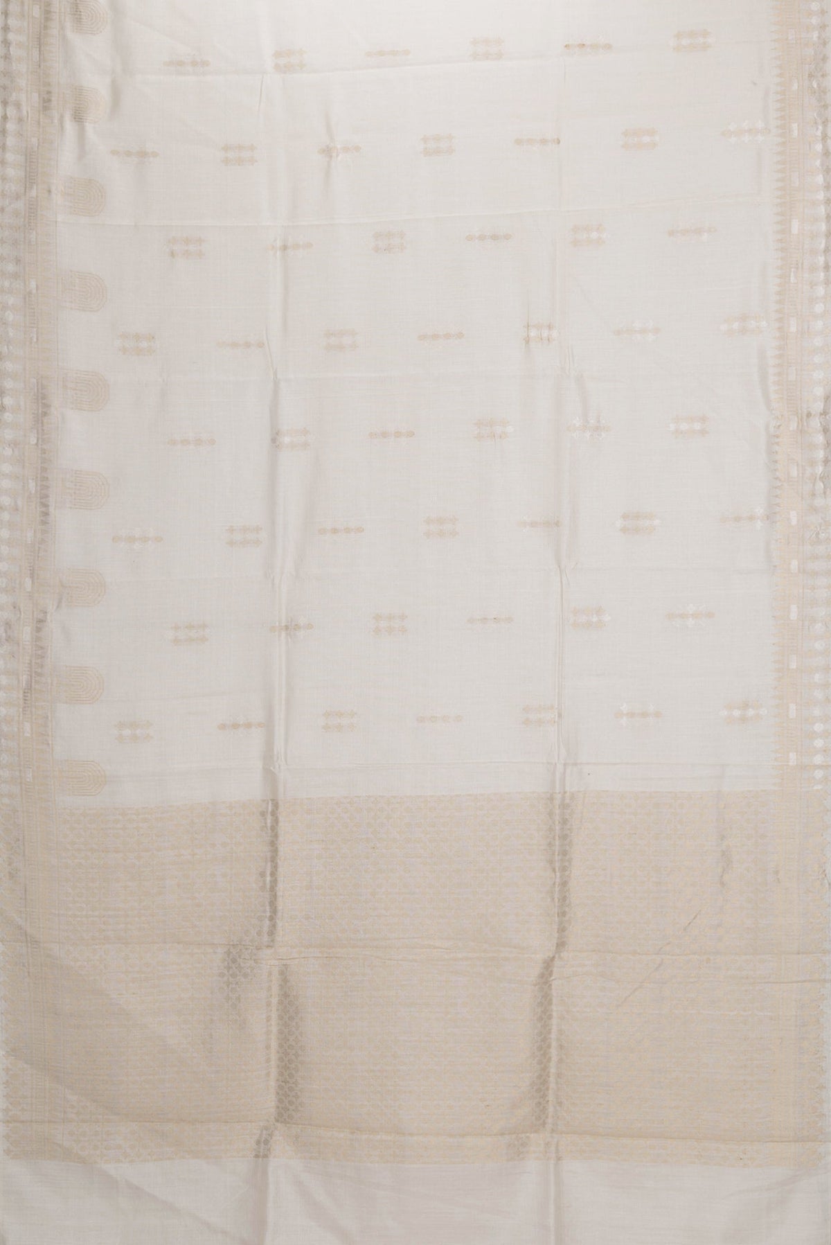 Flat view of Beige Dual Tone Tussar Silk Saree with Zari Butta on the body and Fancy Border. 