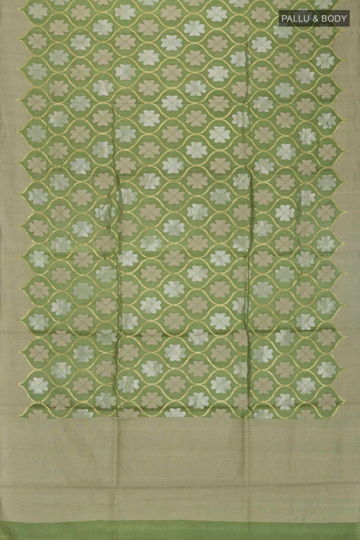Flat view of Green Tussar Silk Saree with Zari Butta on the body and Plain Border