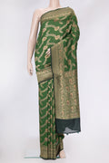 Bottle Green Dual Tone Tussar Silk Saree with Zari Brocade on the body and Zari Border.  displayed on a mannequin
