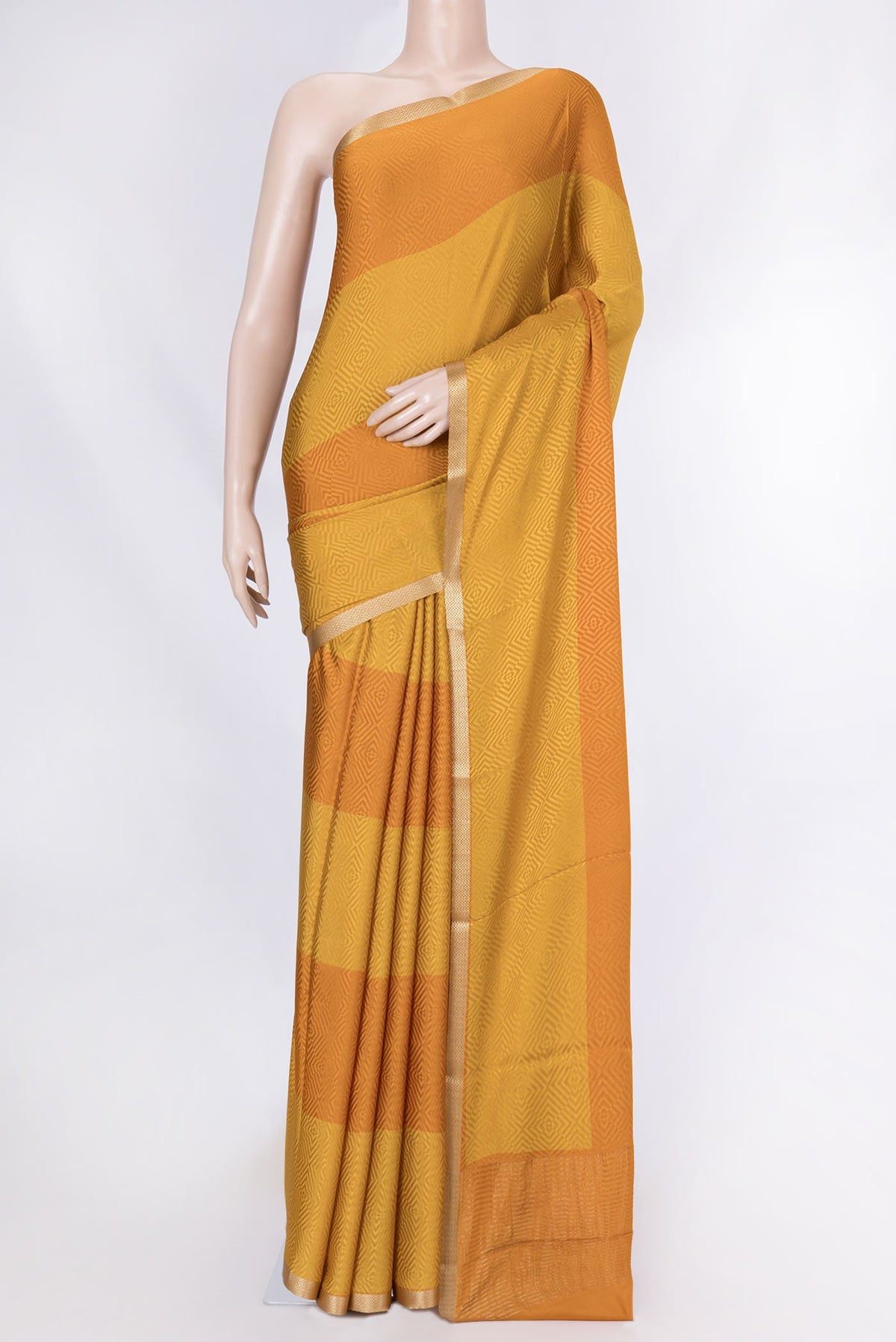 Mustard Dual Tone Tussar Silk Saree with Printed design on the body and Zari Border displayed on a mannequin