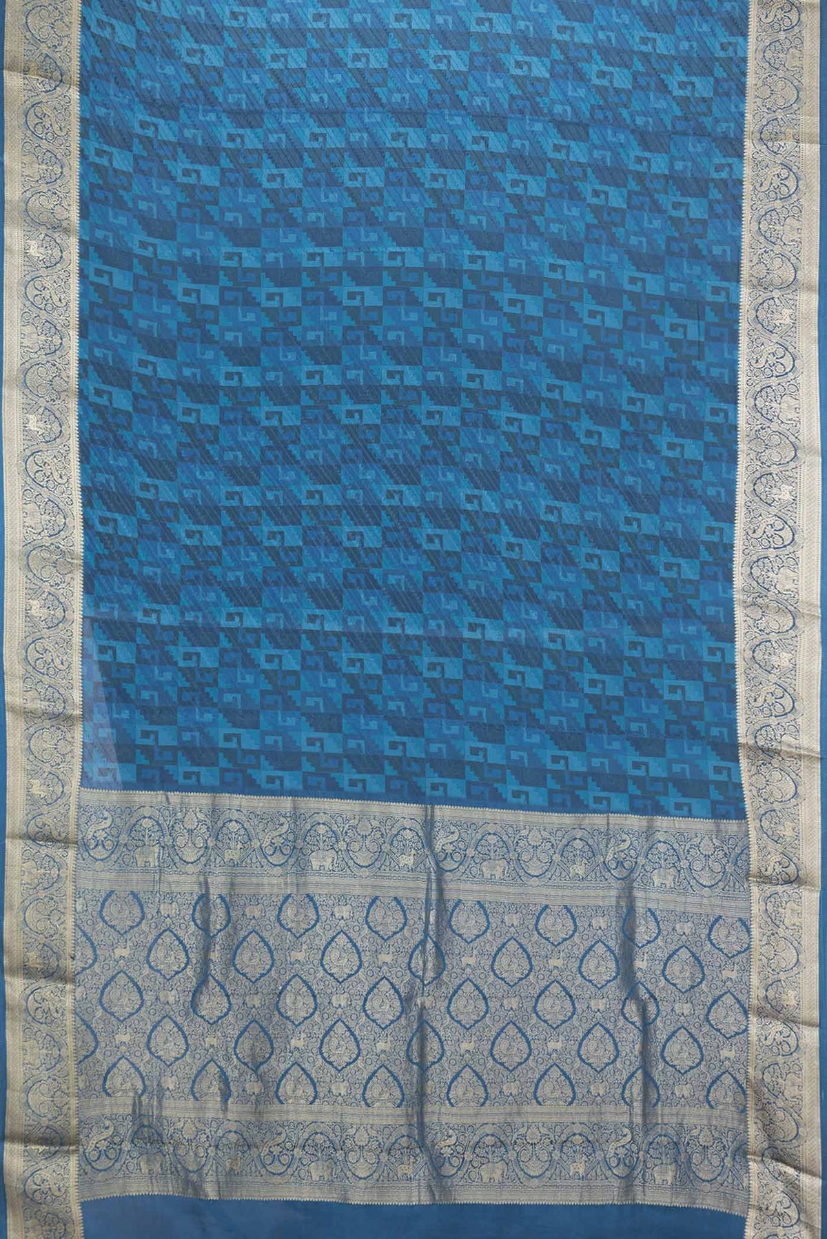 Flat view of Blue Dual Tone Mysore Crepe Saree with Printed design on the body and Zari Border
