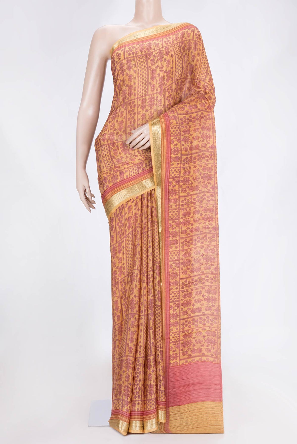 Sandal Dual Tone Mysore Crepe Saree with Printed design on the body and Zari Border.  displayed on a mannequin