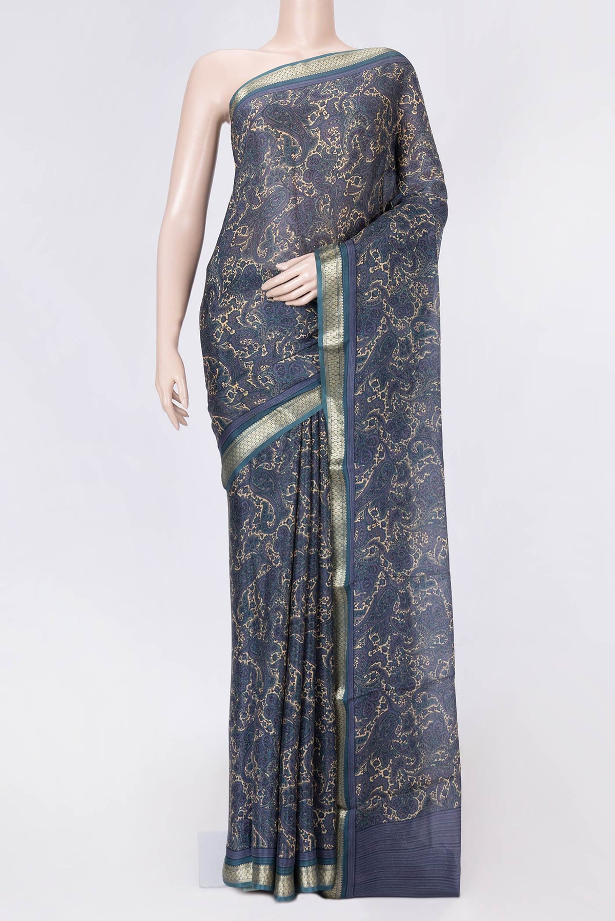 Blue Grey Dual Tone Mysore Crepe Saree with Printed design on the body and Zari Border displayed on a mannequin
