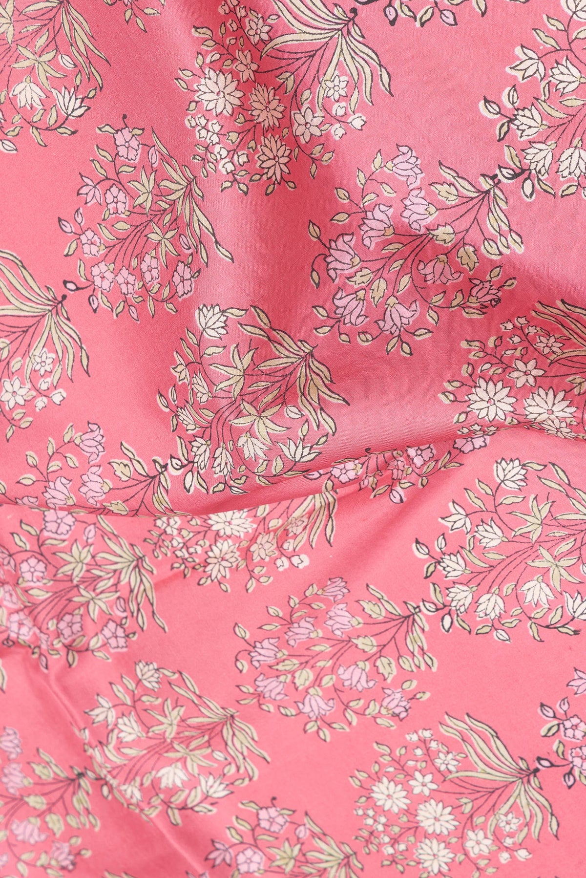 Close up of Pink Dual Tone Kanchipuram Silk Saree with Printed design on the body and Zari Border.  displaying folds