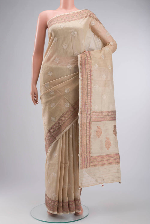 Beige Bhagalpuri Tussar Silk Saree with Embroidery on the body and Zari Border displayed on a mannequin