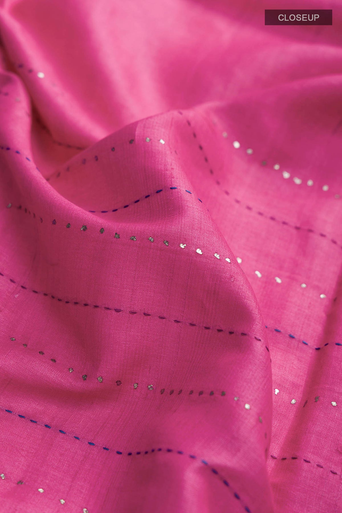 Close up of Pink Bhagalpuri Tussar Silk Saree with Embroidery on the body and Embroidery Border displaying folds