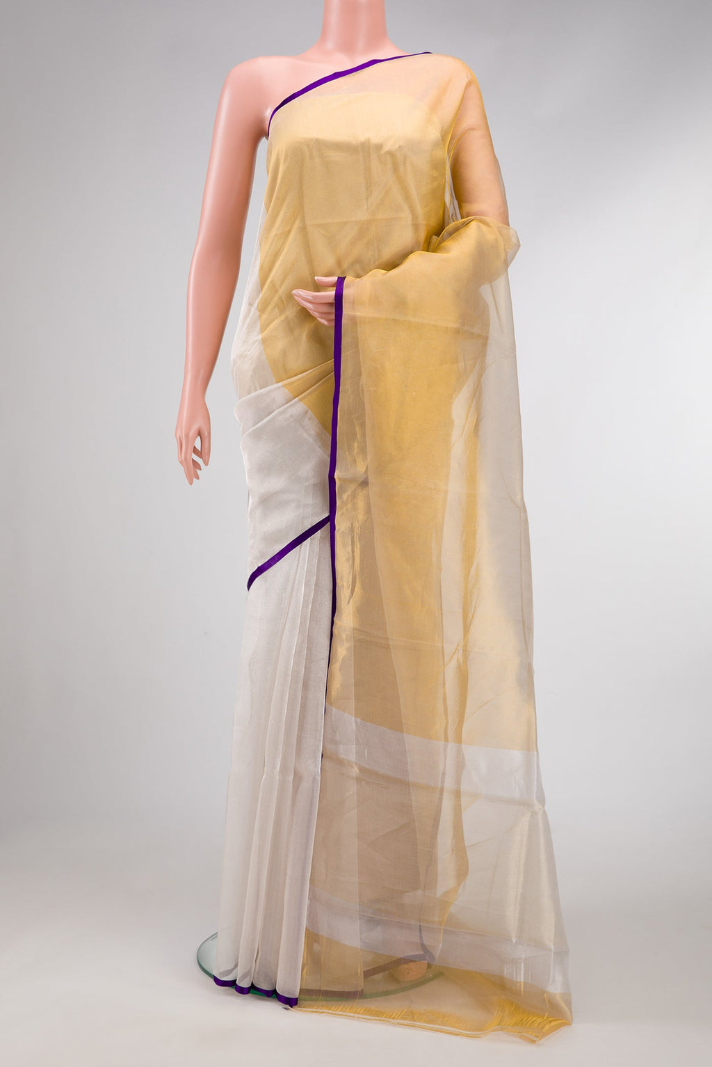 Silver and Gold Color Organza Silk Saree with Plain Body and Plain Border.  displayed on a mannequin