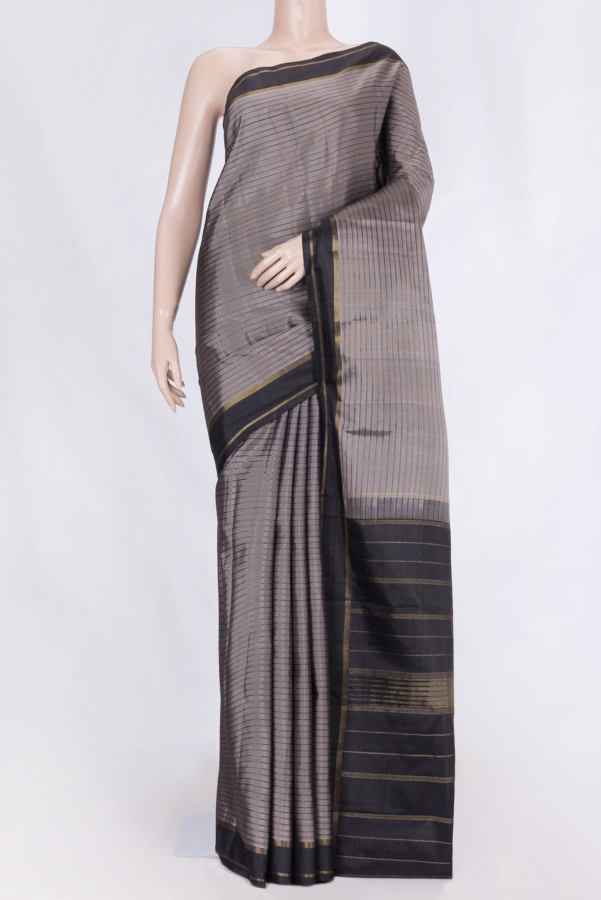 Grey Dual Tone Kanchipuram Silk Saree with Stripes on the body and Zari Border displayed on a mannequin
