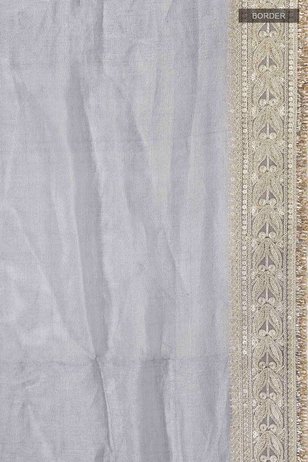 Border image of Lilac Tissue Silk Saree with Plain Body and Embroidery Border