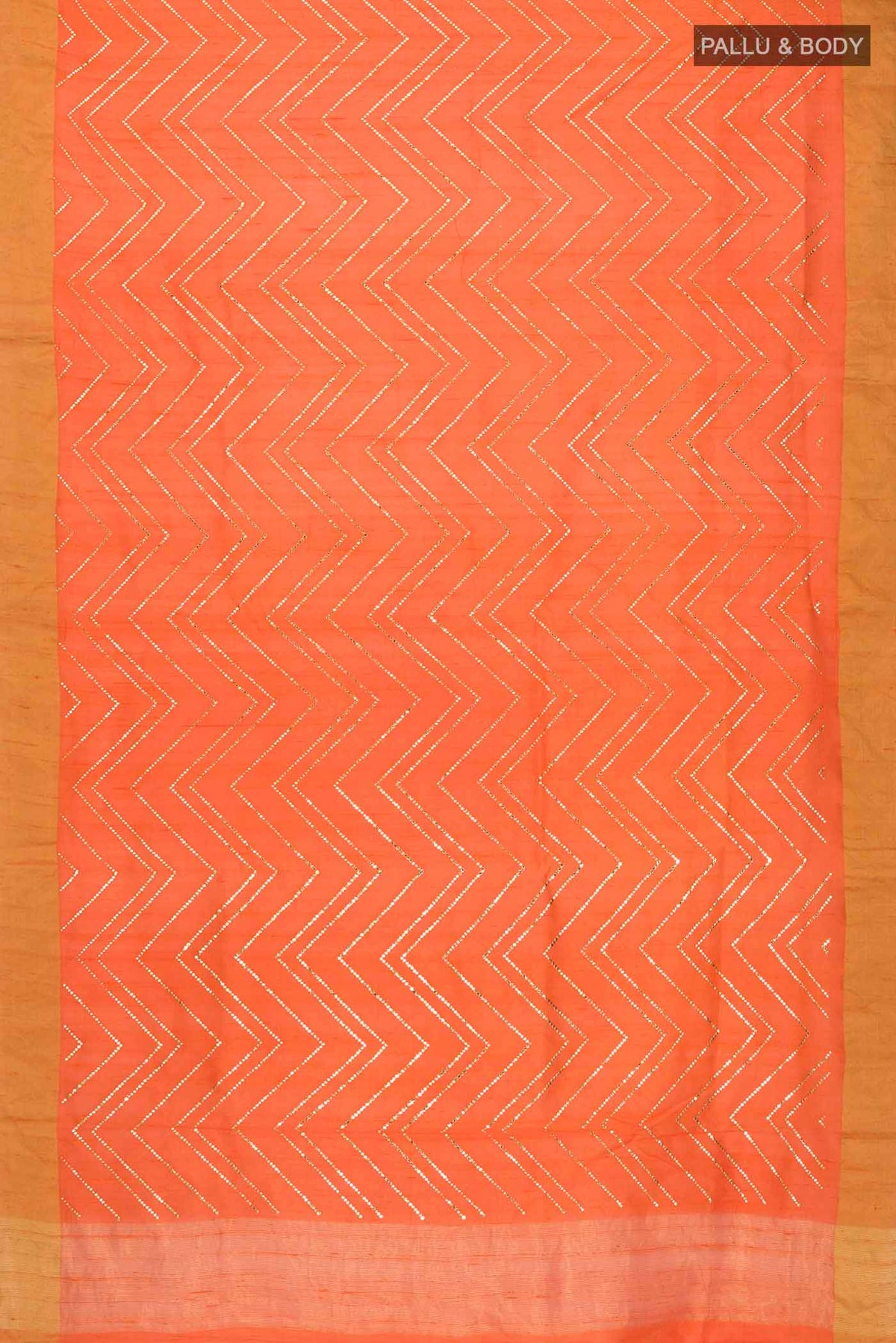 Flat view of Orange Raw Silk Saree with Embroidery on the body and Zari Border