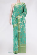 Sea Green Dual Tone Tussar Silk Saree with Zari Brocade on the body and Zari Border.  displayed on a mannequin