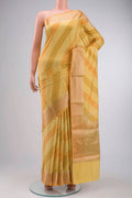 Multi Color Banarasi Raw Silk Saree with Zari Butta on the body and Zari Border displayed on a mannequin