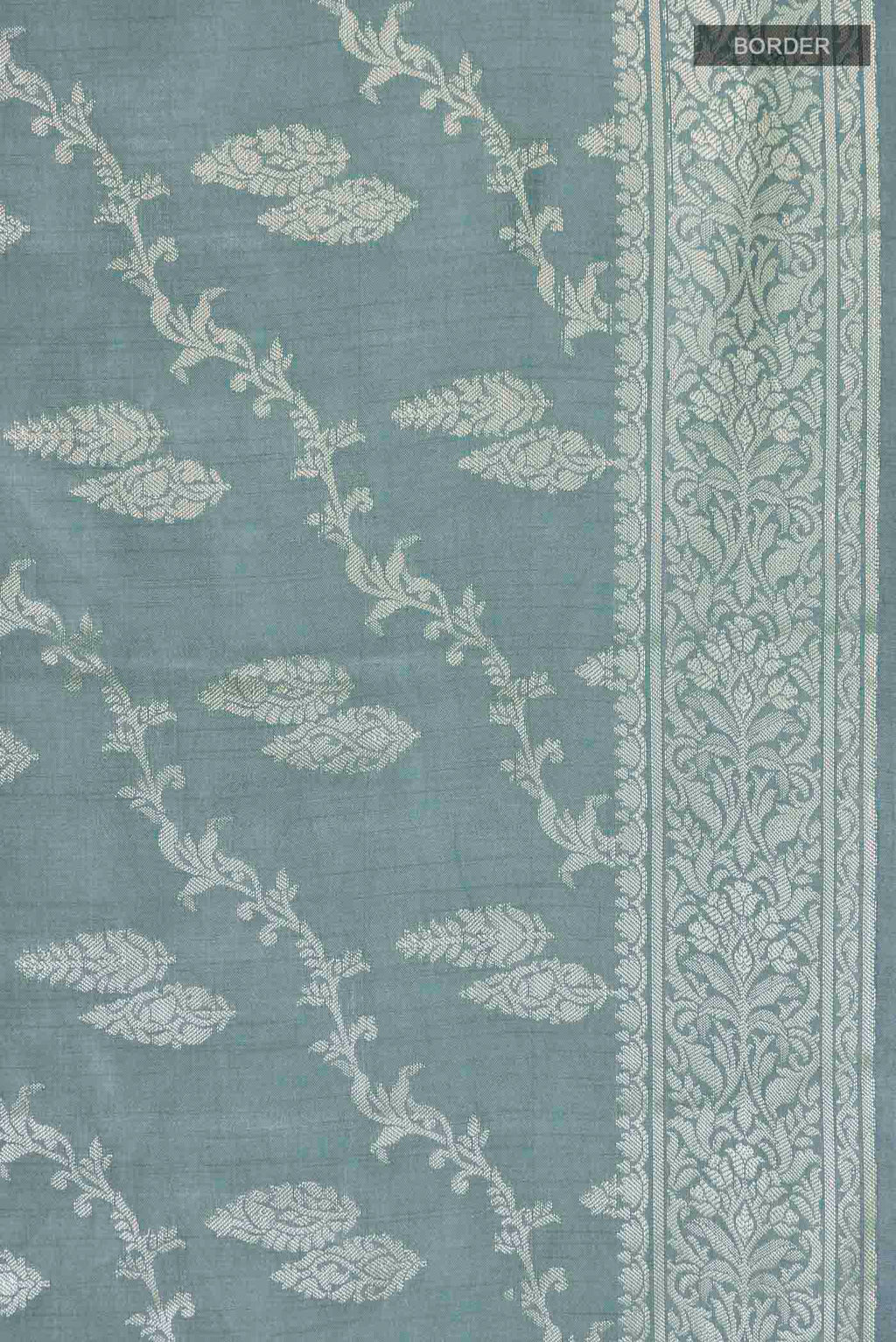 Border image of Green Banarasi Raw Silk Saree with Zari Butta on the body and Zari Border