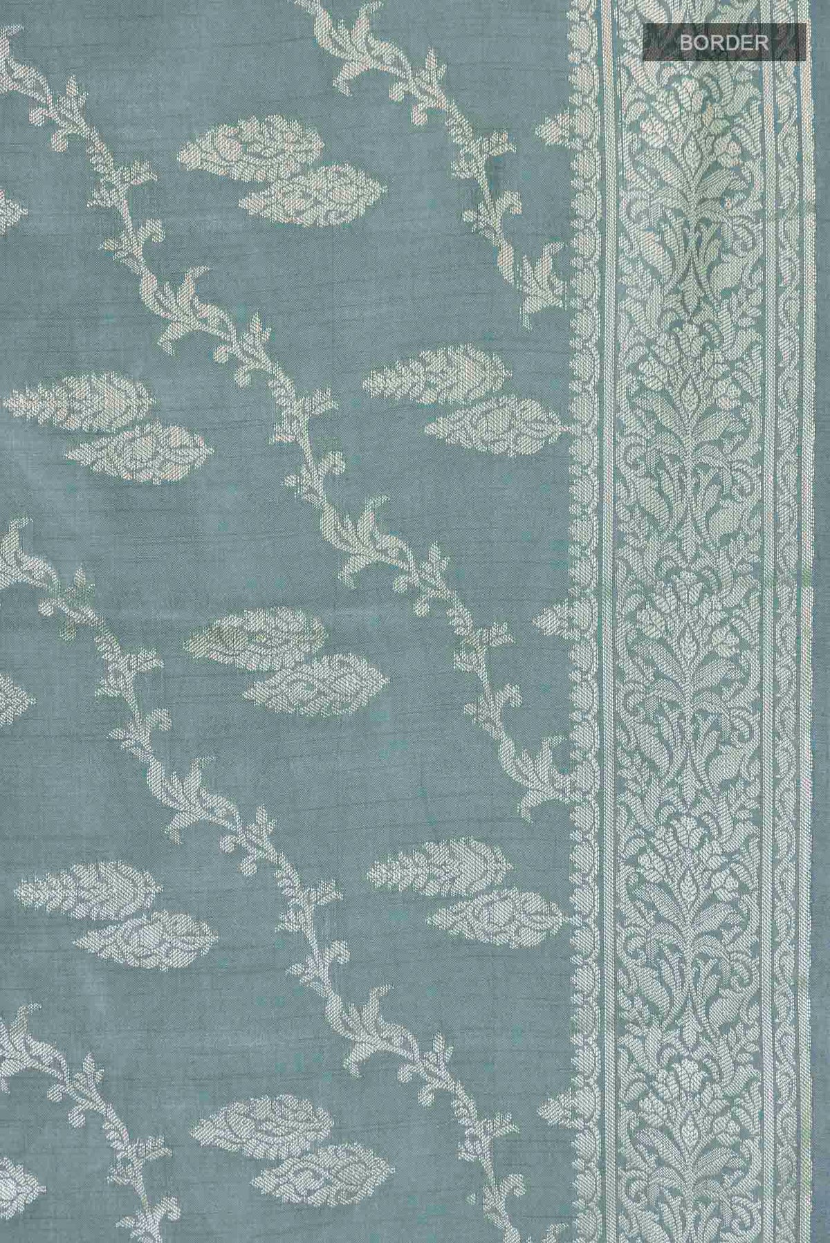 Border image of Green Banarasi Raw Silk Saree with Zari Butta on the body and Zari Border