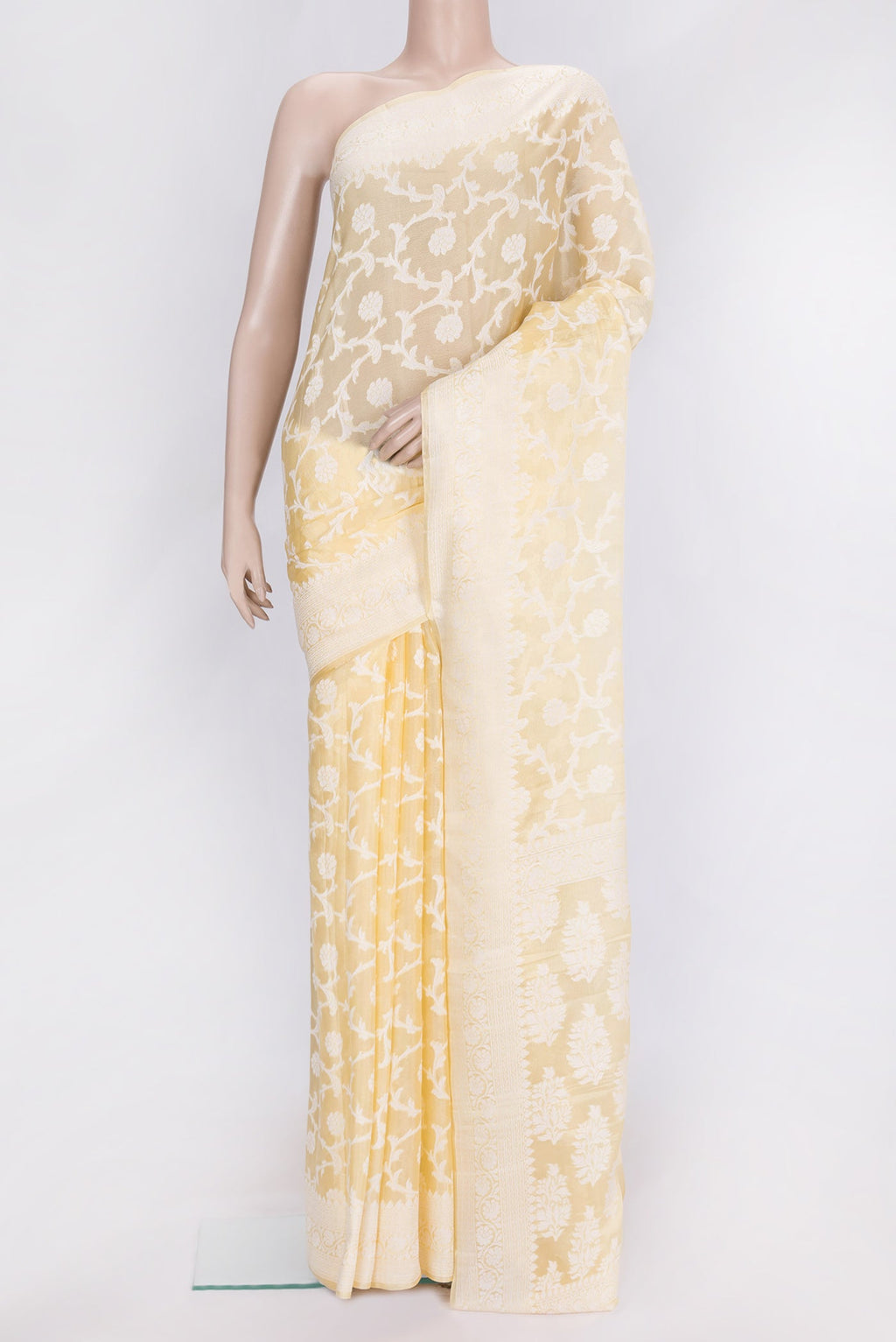 Sandal Dual Tone Mysore Georgette Saree with Zari Brocade on the body and Thread Border.  displayed on a mannequin