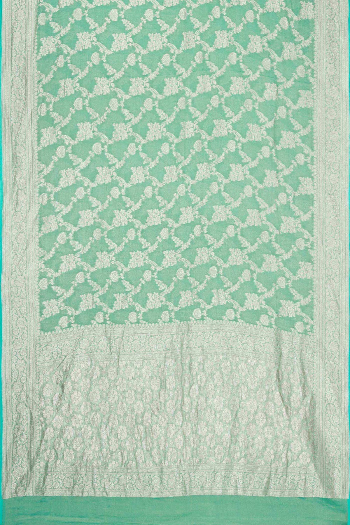 Flat view of Green Dual Tone Banarasi Georgette Saree with Zari Brocade on the body and Zari Border. 