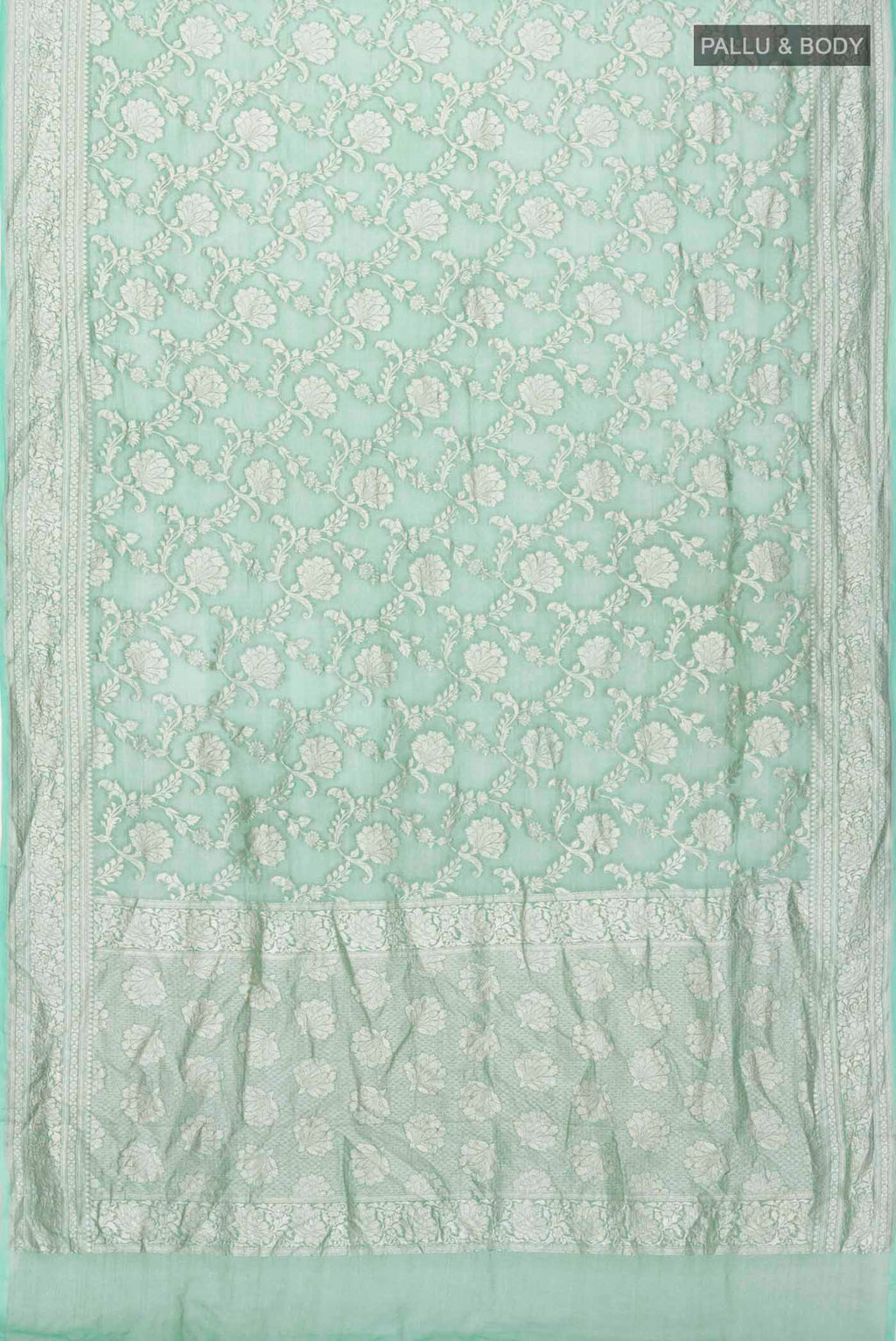 Flat view of Green Banarasi Georgette Saree with Zari Butta on the body and Zari Border