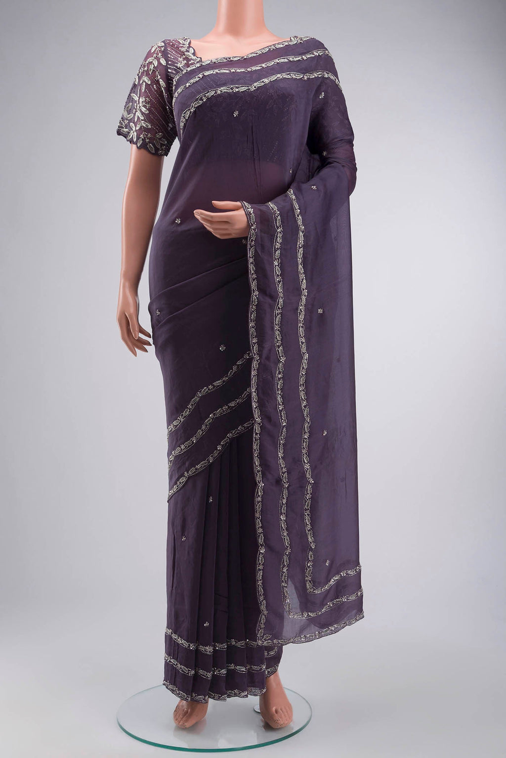 Lilac Satin Silk Saree with Plain Body and Embroidery Border displayed on a mannequin