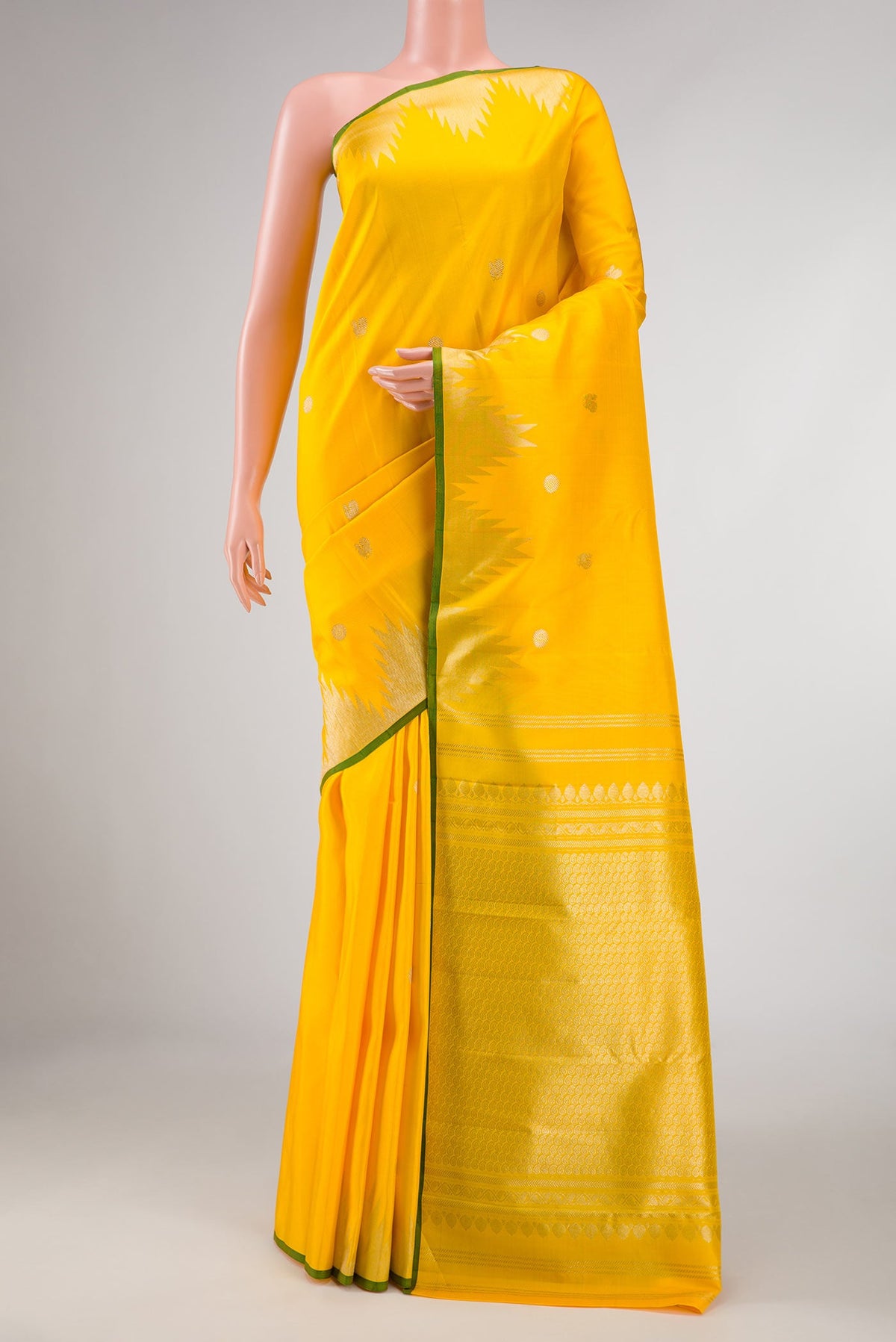 Yellow Dual Tone Kanchipuram Silk Saree with Zari Butta on the body and Temple Border displayed on a mannequin