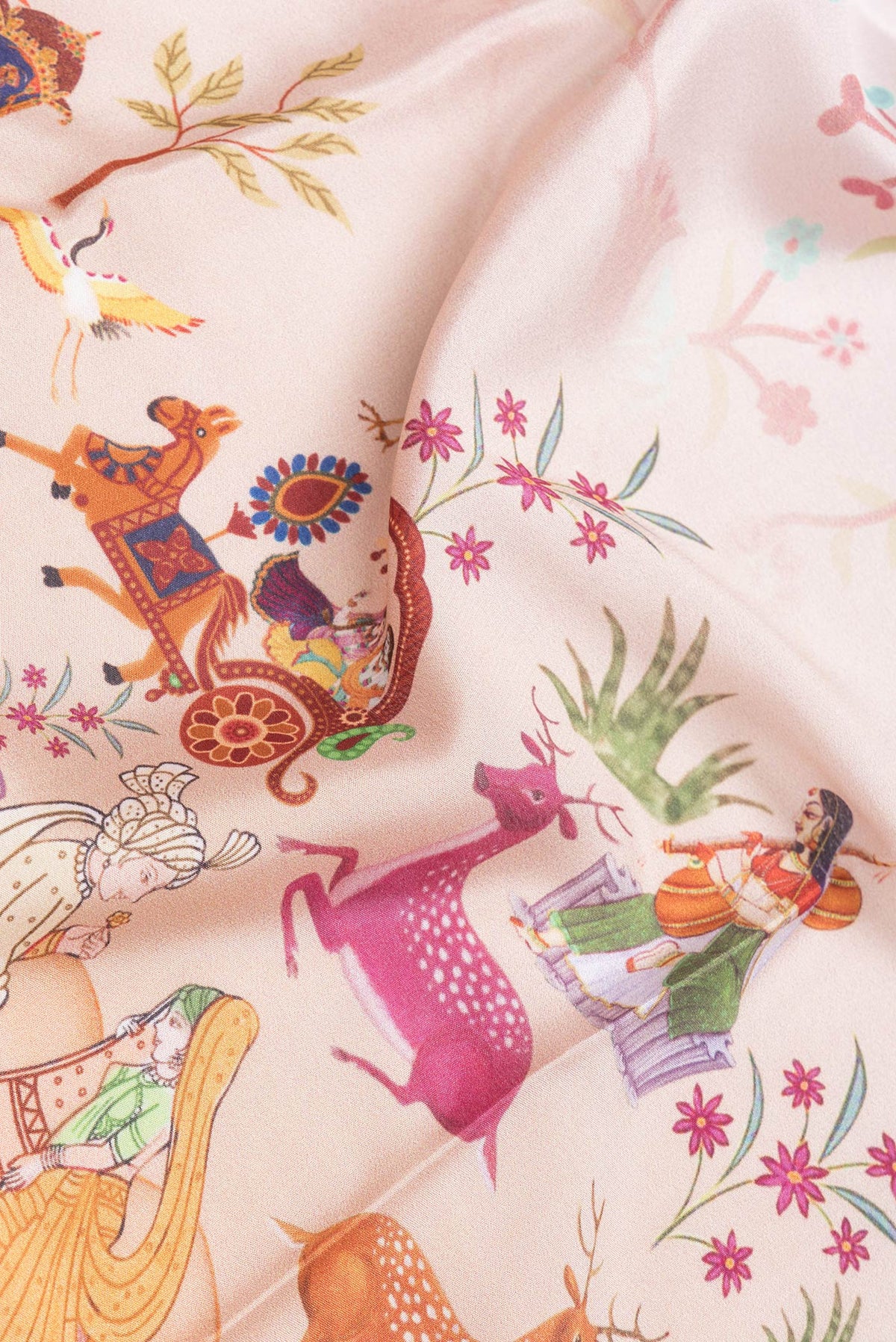 Close up of Off White Dual Tone Mysore Silk Saree with Printed design on the body and Fancy Border.  displaying folds