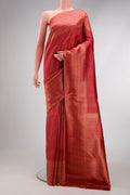 Red Dual Tone Kanjivaram Silk Saree with Zari Brocade on the body and Zari Border.  displayed on a mannequin
