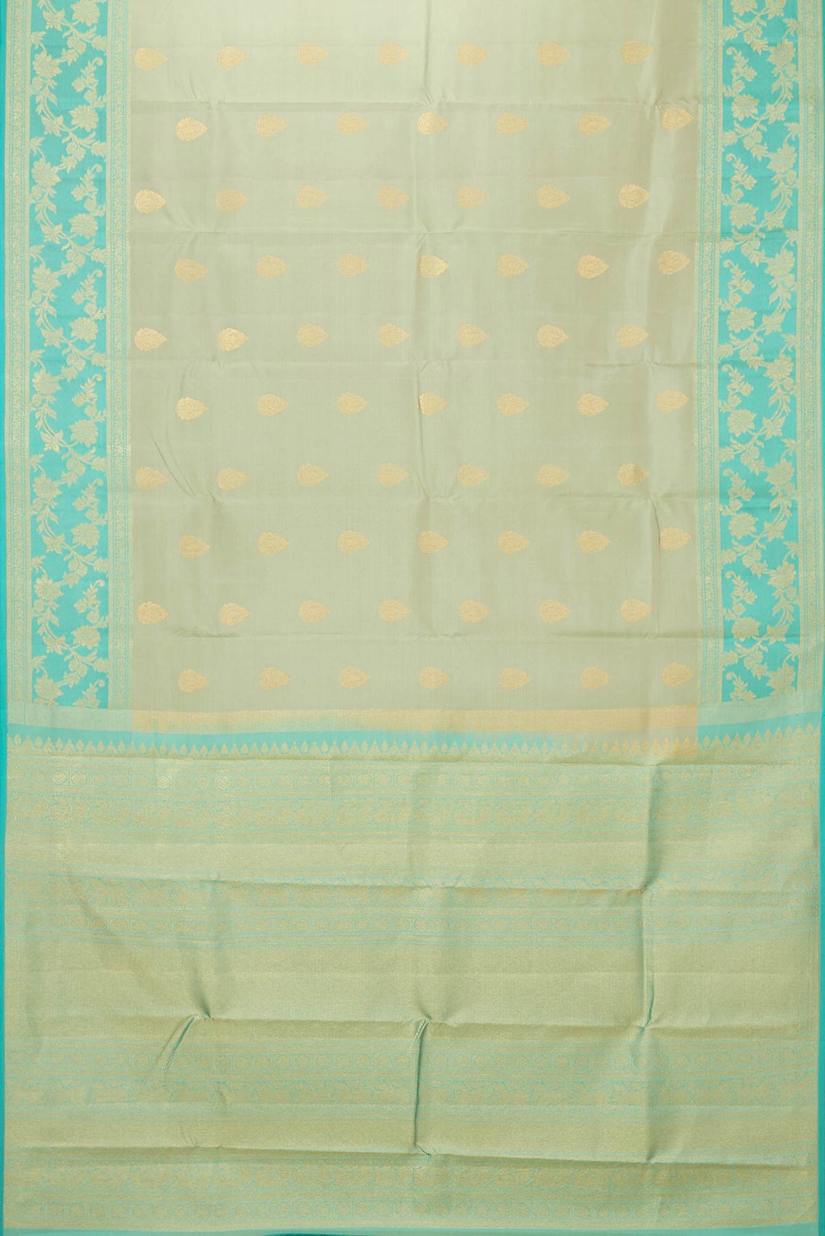 Flat view of Pista Green Dual Tone Kanchipuram Saree with Zari Butta on the body and Zari Border