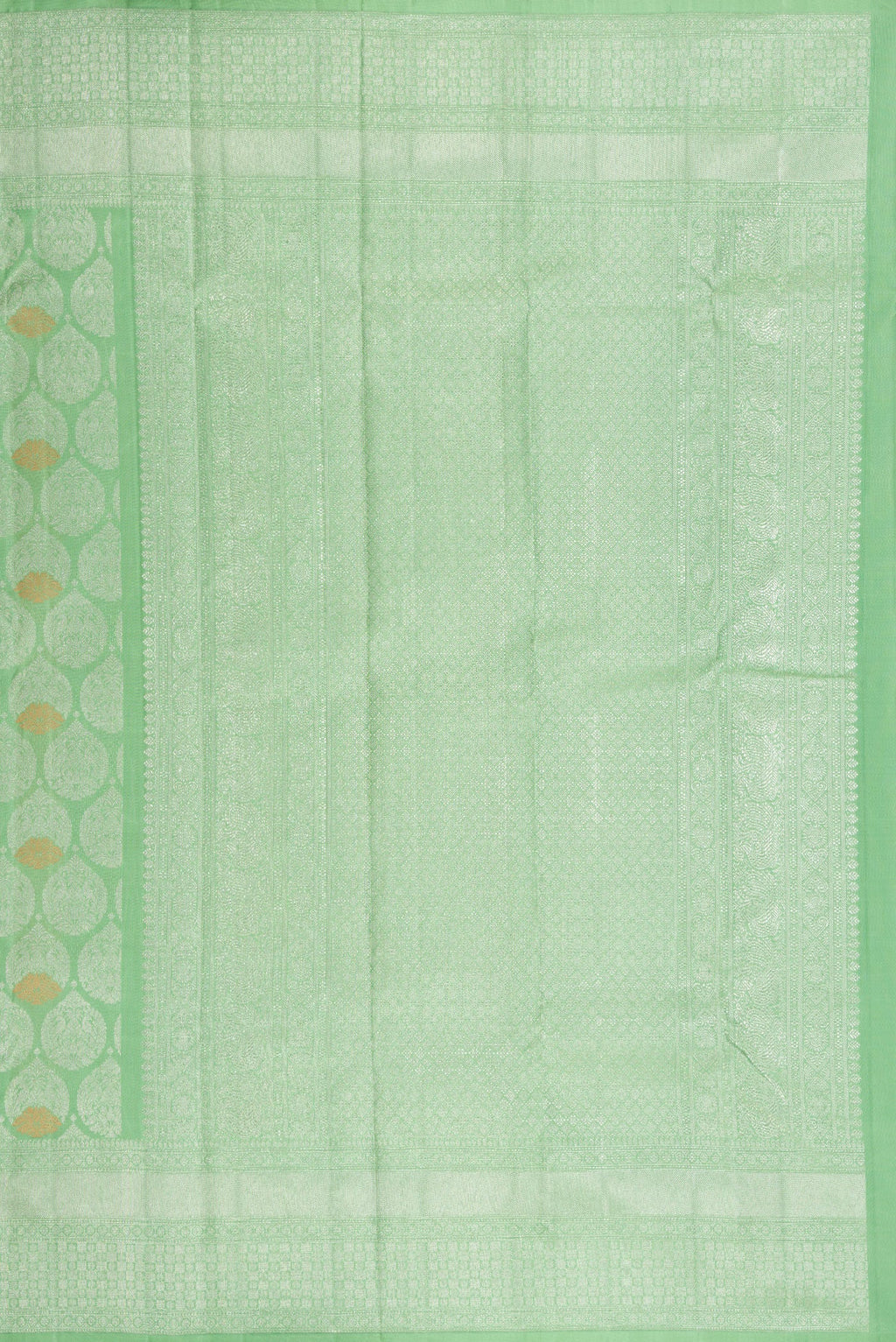 Close up image of the pallu of Light Green Dual Tone Kanchipuram Silk Saree with Zari Brocade on the body and Zari Border. 