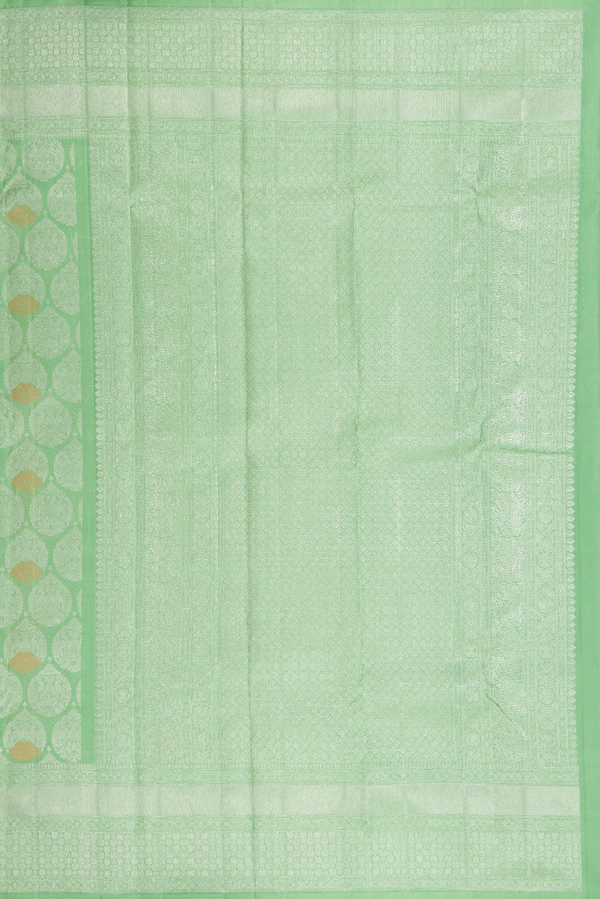 Close up image of the pallu of Light Green Dual Tone Kanchipuram Silk Saree with Zari Brocade on the body and Zari Border. 