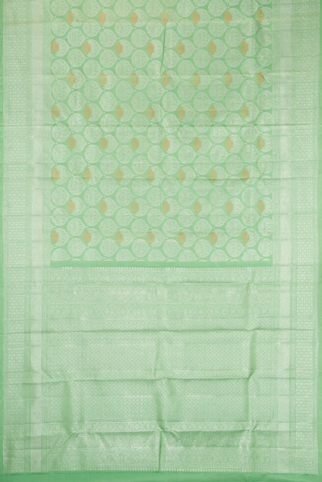 Flat view of Light Green Dual Tone Kanchipuram Silk Saree with Zari Brocade on the body and Zari Border. 
