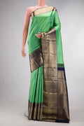 Sea Green Dual Tone Kanchipuram Silk Saree with Zari Brocade on the body and Zari Border.  displayed on a mannequin