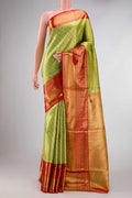 Green Dual Tone Kanchipuram Tissue Silk Saree with Zari Brocade on the body and Zari Border displayed on a mannequin