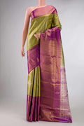 Green Dual Tone Kanchipuram Tissue Silk Saree with Zari Brocade on the body and Zari Border displayed on a mannequin