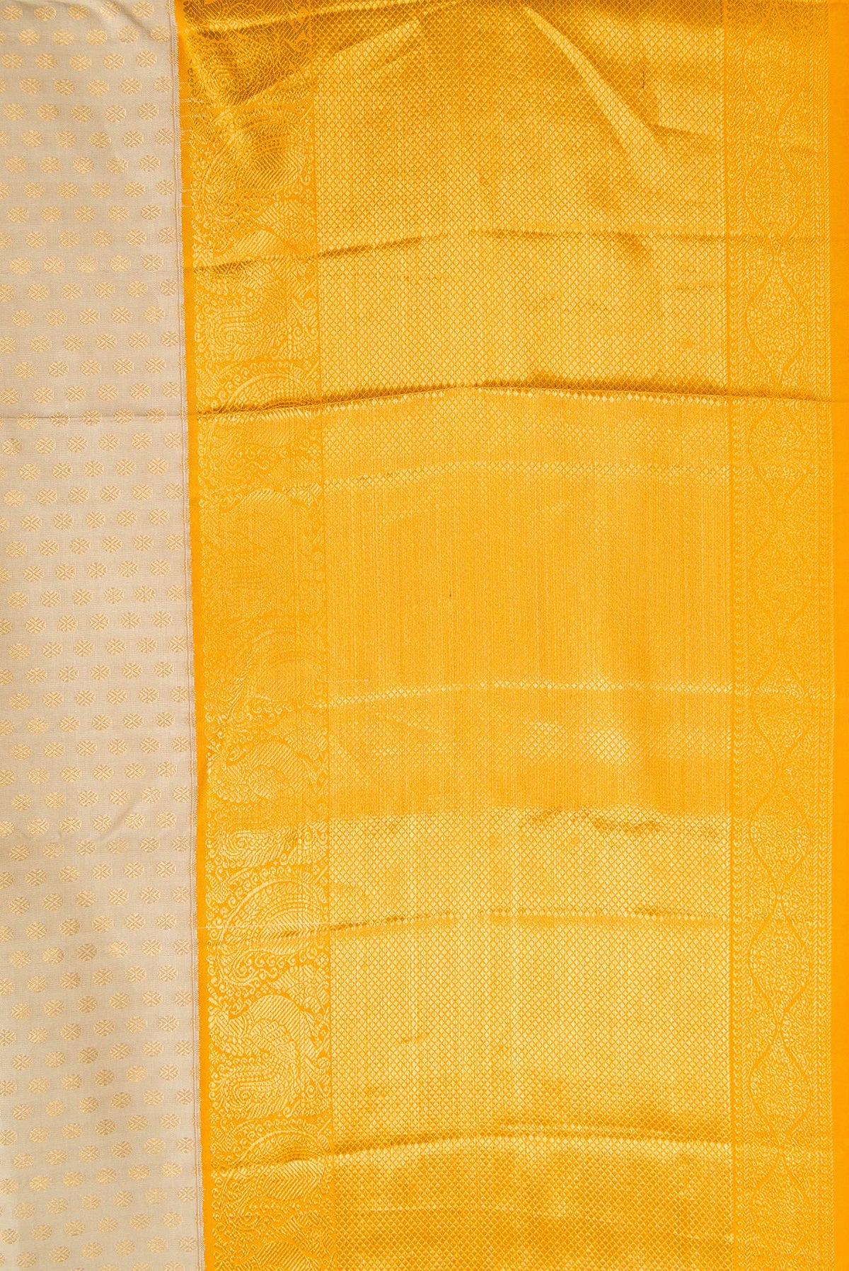 Border image of Beige Dual Tone Kanjivaram Silk Saree with Zari Brocade on the body and Zari Border. 