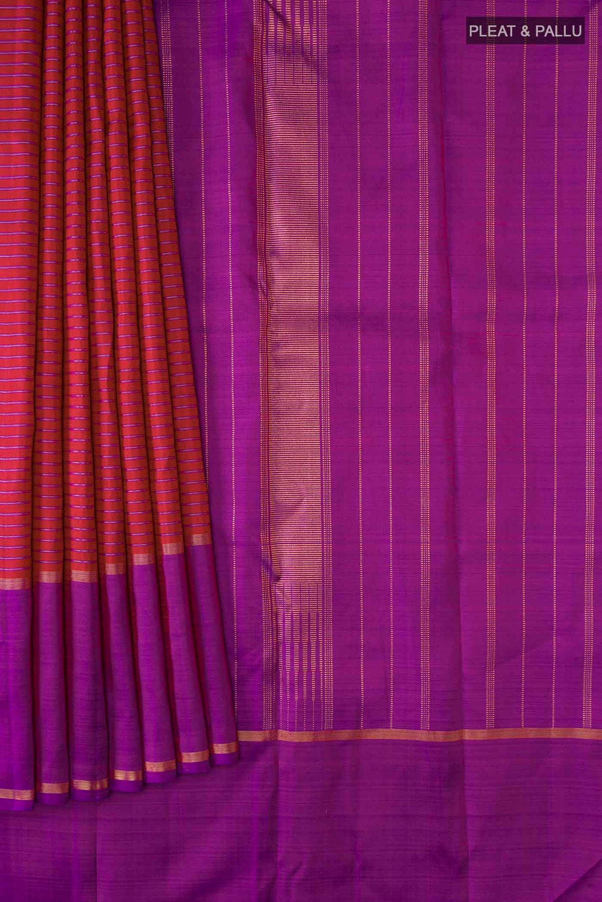 Pleats and pallu of Maroon Kanchipuram Silk Saree with Stripes on the body and Zari Border