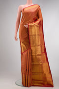 Red Dual Tone Kanchipuram Silk Saree with Zari Brocade on the body and Zari Border.  displayed on a mannequin