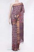 Purple Tussar Silk Saree with Printed design on the body and Embroidery Border.  displayed on a mannequin