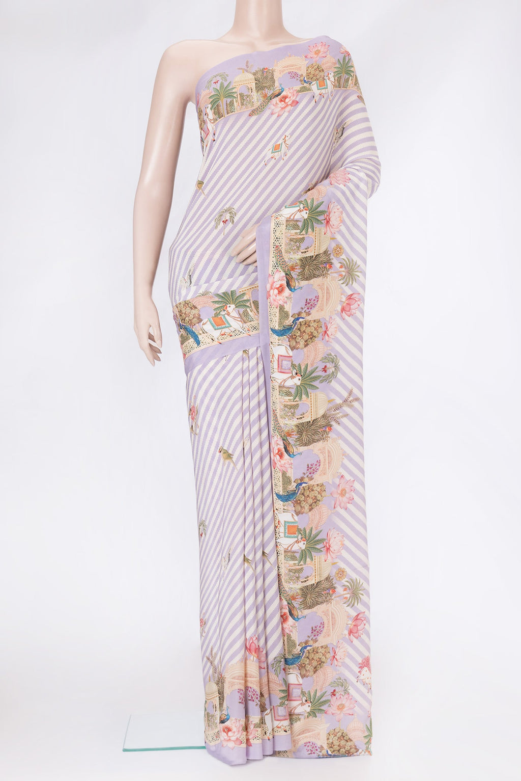 Lavender Mysore Crepe Saree with Printed design on the body and Plain Border.  displayed on a mannequin