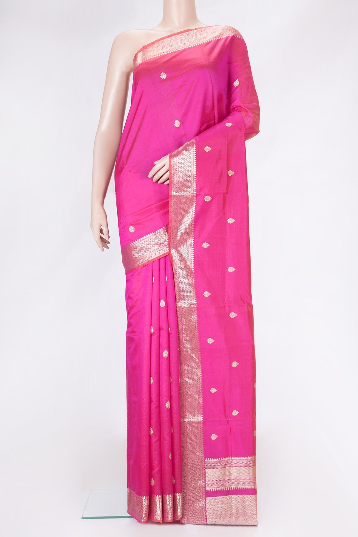 Pink Dual Tone Banarasi Silk Saree with Zari Butta on the body and Zari Border.  displayed on a mannequin