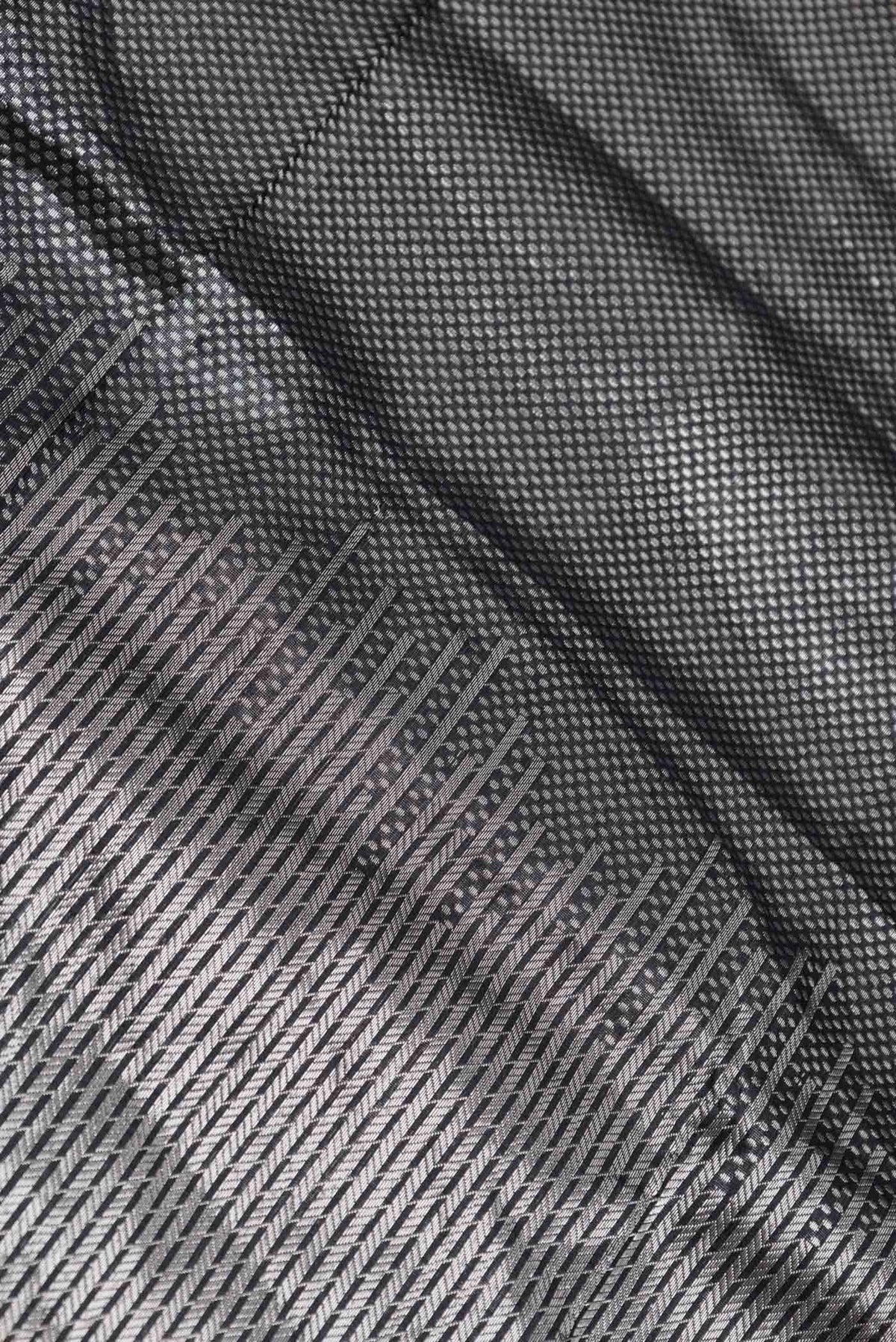 Close up of Black Banarasi Silk Saree with Zari Brocade on the body and Zari Border displaying folds