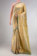 Gold Dual Tone Kanchipuram Tissue Silk Saree with Zari Brocade on the body and Zari Border displayed on a mannequin