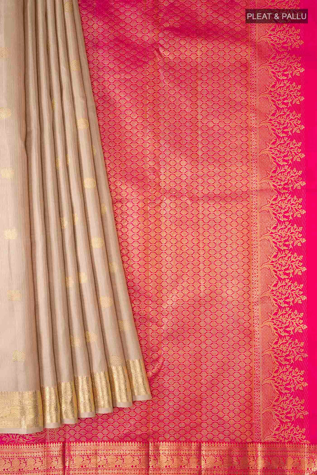 Pleats and pallu of Beige Kanchipuram Silk Saree with Zari Butta on the body and Zari Border