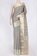 Grey Kanchipuram Silk Saree with Jacquard design on the body and Zari Border displayed on a mannequin