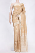 Beige Dual Tone Kanjivaram Saree with Thread Butta on the body and Thread Border.  displayed on a mannequin